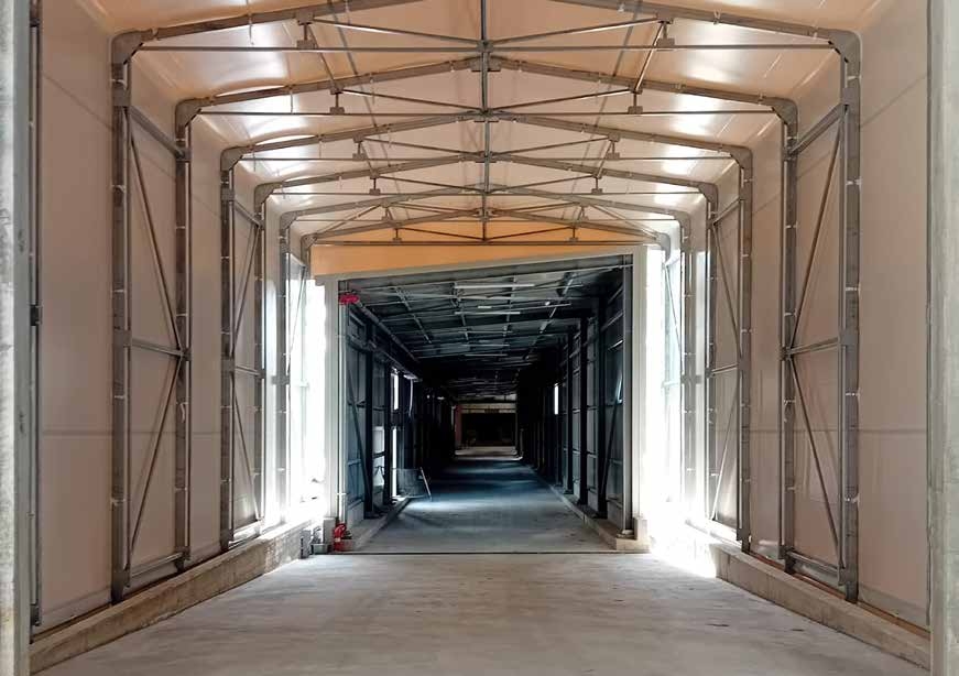 Tunnel Mobile Industriale da Banchina con Sigillante | Spatium